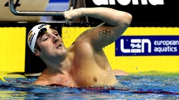 Schwimmer Marco Koch zeigt sein Olympia-Tattoo. © picture alliance / CITYPRESS24 Foto: Gep/CITYPRESS24