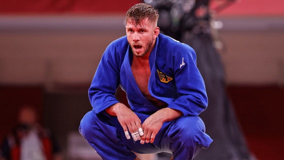 Der deutsche Judoka Dominic Ressel in der Klasse bis 81 kg reagiert. © dpa-Bildfunk Foto: Oliver Weiken/dpa